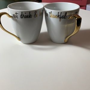 Two gold Handle coffee mugs